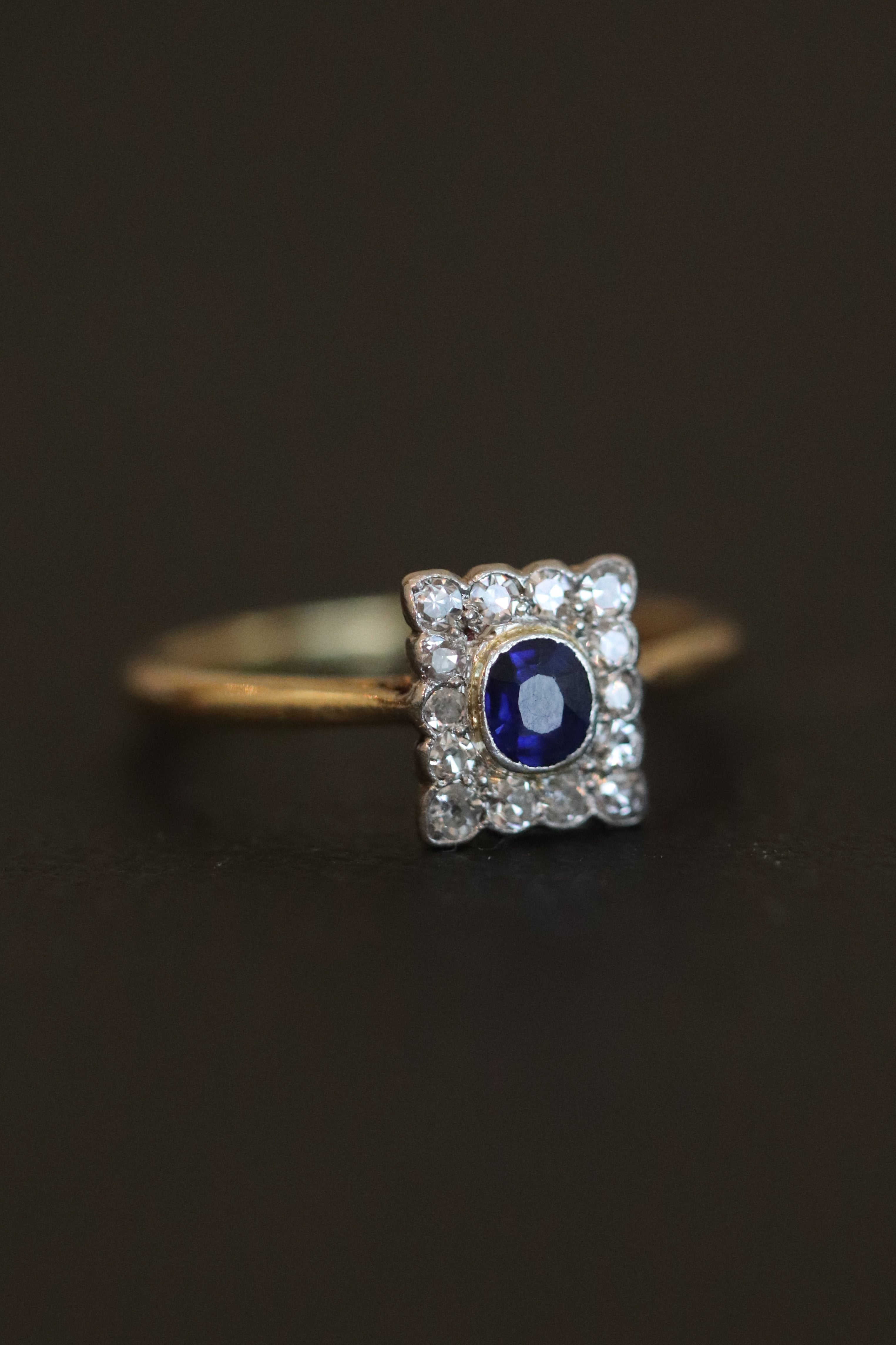 Edwardian sapphire ring with diamond cluster