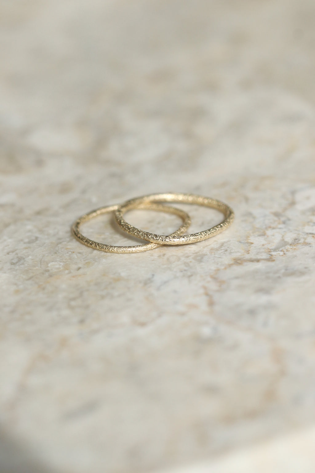 Coral stackable spacer ring