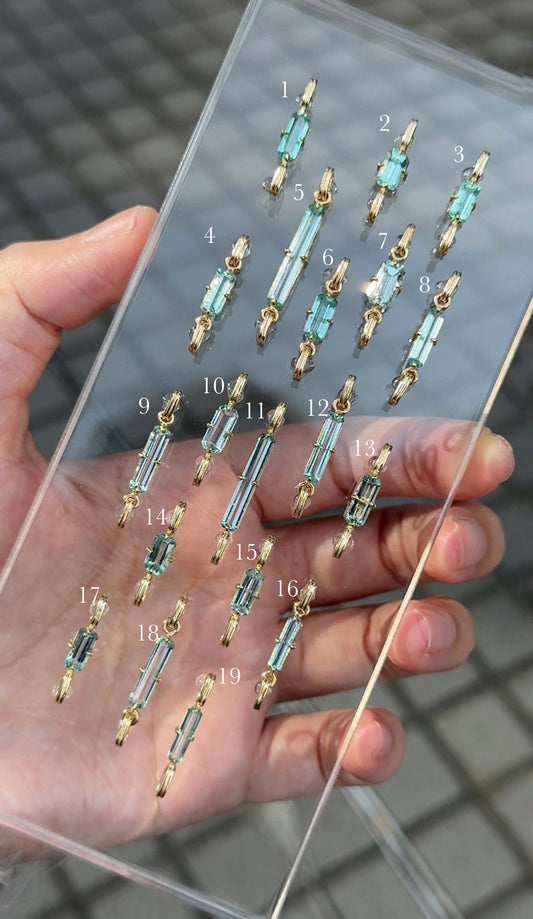 Light pipe green beryl charm